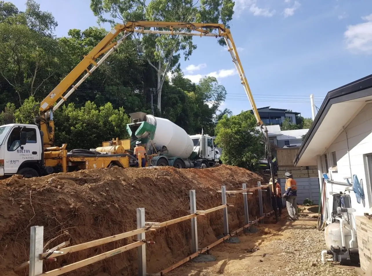 Concrete pump pouring footings