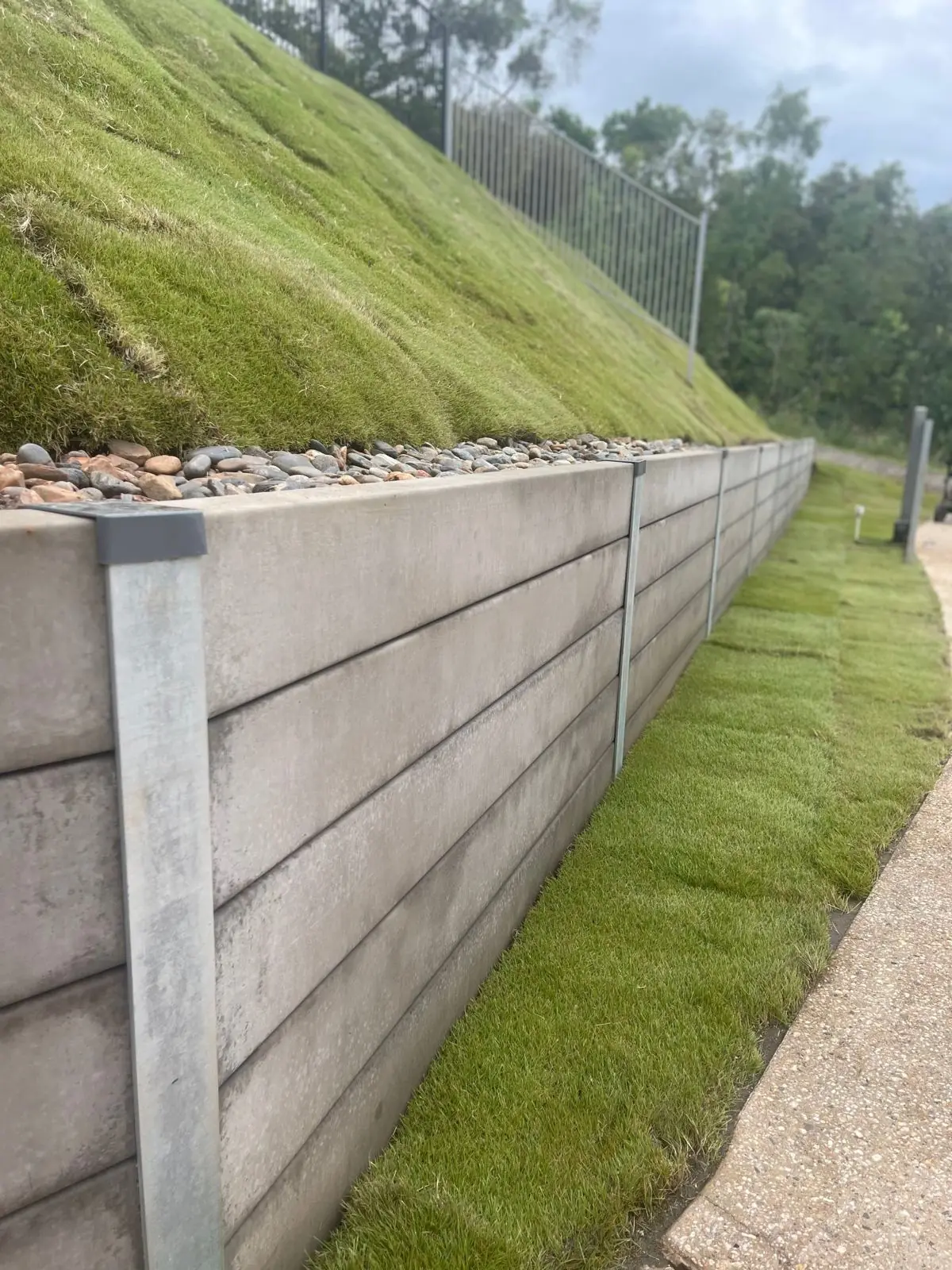 New turf along a retaining wall