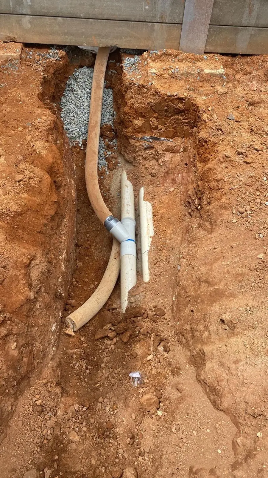 Ag line joined into a stormwater junction in an open trench
