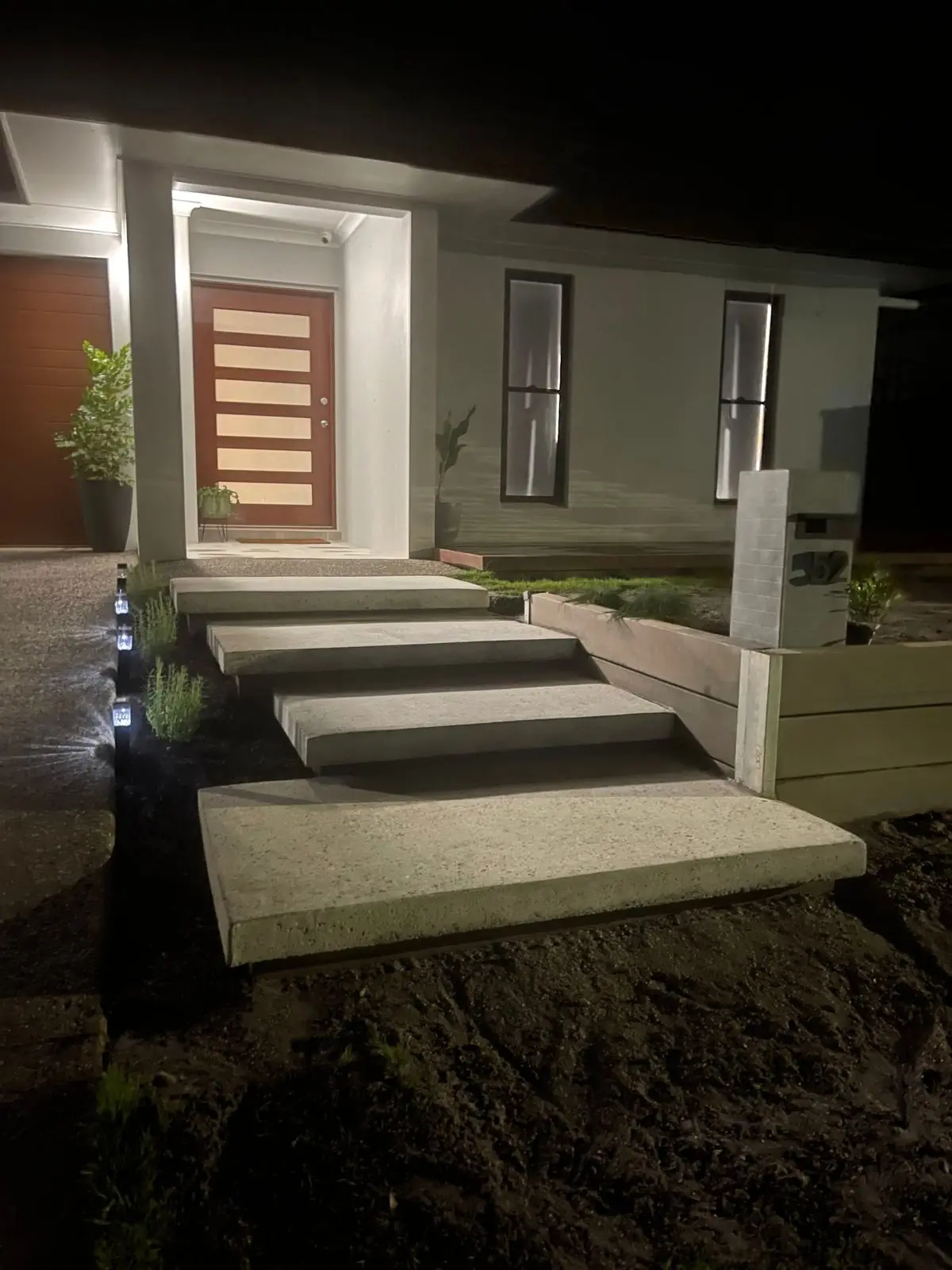 Floating steps and garden bed with lighting