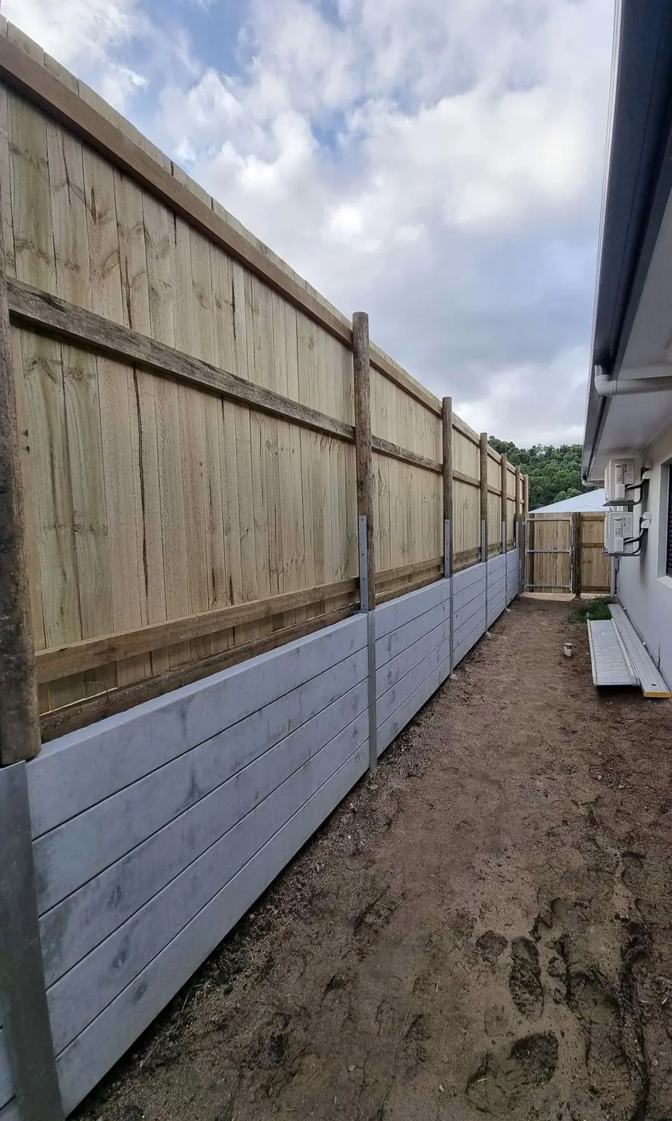 Plain concrete + timber fence