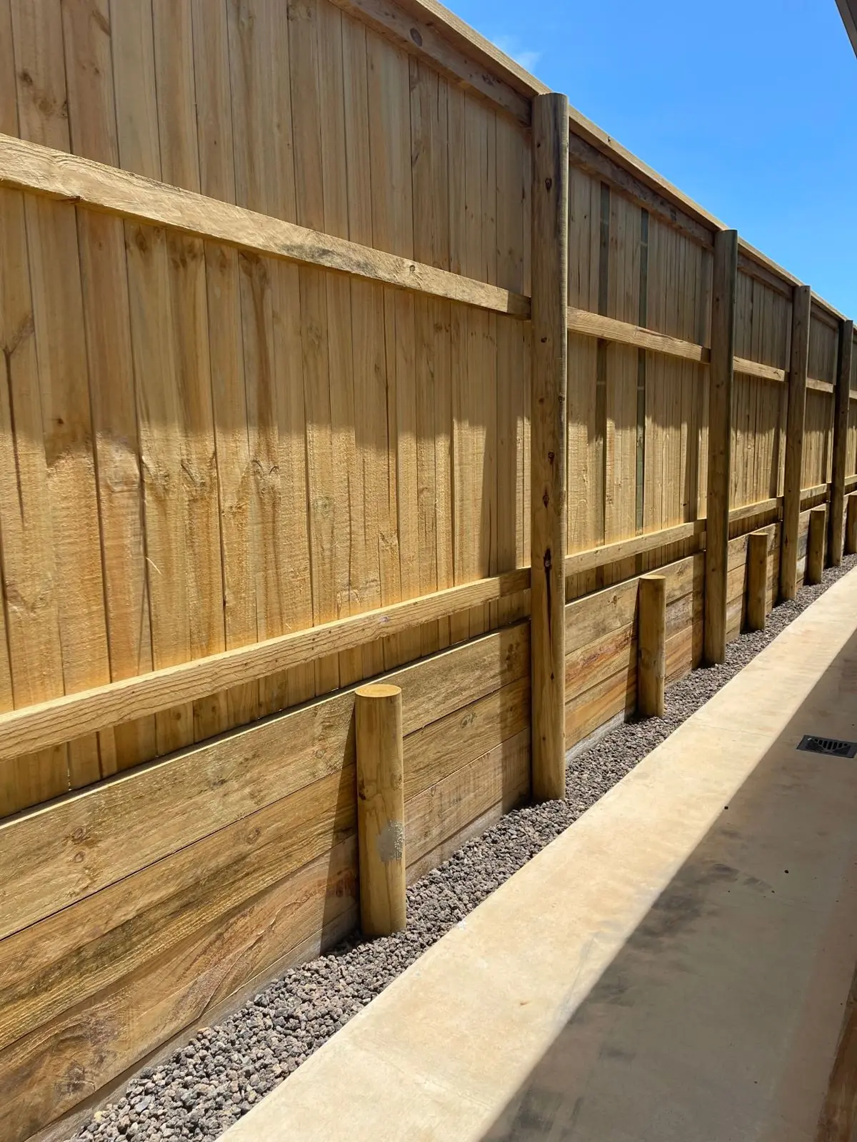 Timber retaining + timber fence