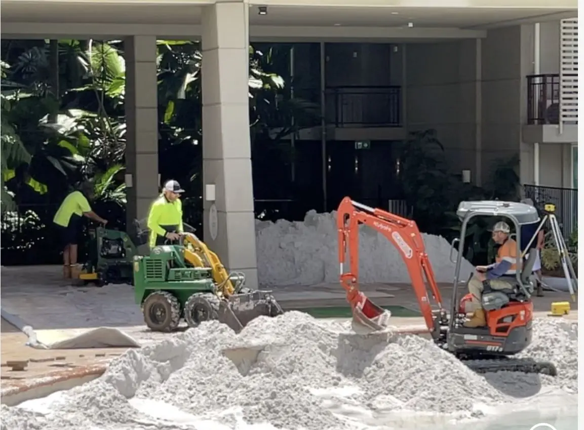 Mini excavator and loader at a Cairns resort